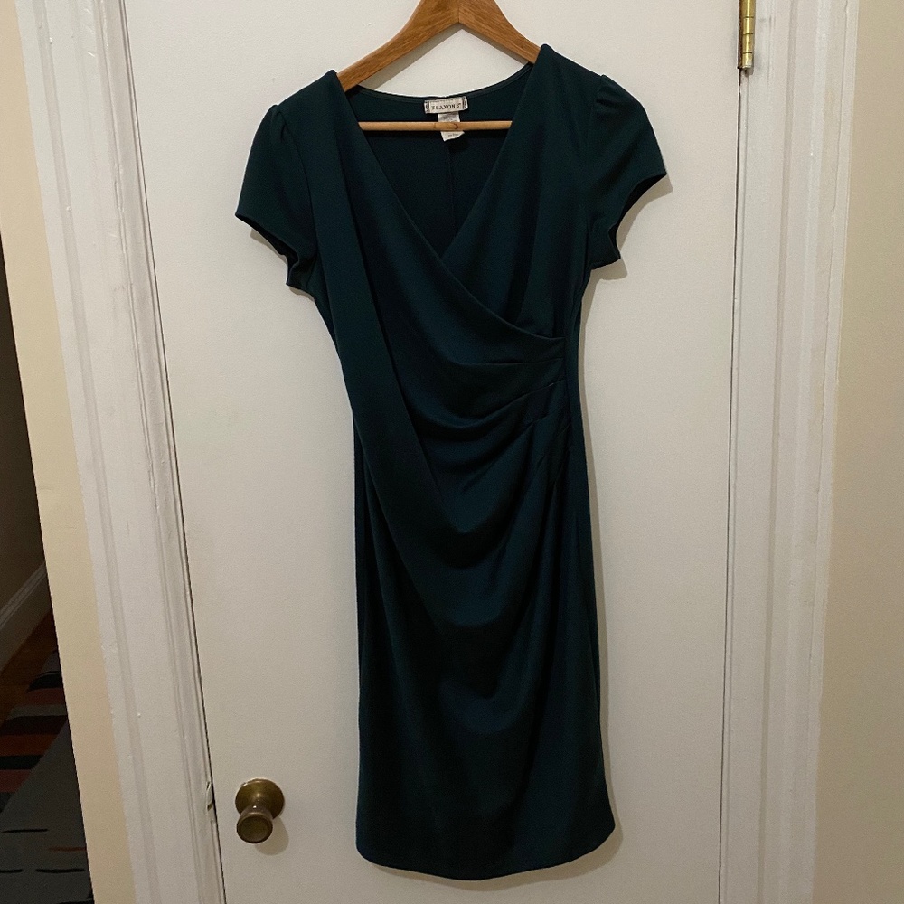 Knee-length dark green wrap dress